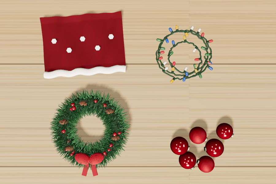 Holiday items laid out on a floor before they are packed into a tote.